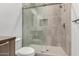 Shower with glass door and gray tiles at 6401 E Larkspur Dr, Scottsdale, AZ 85254