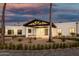 Single-story desert home with a porte cochere, a three-car garage, and desert landscaping at 6401 E Larkspur Dr, Scottsdale, AZ 85254
