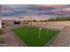 Entertain with a fun putting green, volleyball court and bench for gathering at 6401 E Larkspur Dr, Scottsdale, AZ 85254