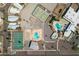 Expansive aerial view featuring community amenities, showcasing pool, tennis and shuffleboard courts, plus parking at 701 S Dobson Rd # 438, Mesa, AZ 85202