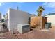 Spacious backyard featuring a storage shed, air conditioning unit, and well-maintained gravel landscape at 701 S Dobson Rd # 438, Mesa, AZ 85202