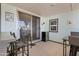 Cozy patio with tile flooring, mini fridge, and view of the outdoors through sliding glass doors at 701 S Dobson Rd # 438, Mesa, AZ 85202