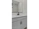 Clean bathroom featuring modern fixtures, white cabinetry, and a spacious vanity at 7448 S 75Th Ln, Laveen, AZ 85339