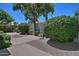 Backyard landscape featuring desert flora and hardscape including stone at 8120 E Cortez Dr, Scottsdale, AZ 85260