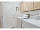 Functional laundry room area equipped with a washer and dryer for convenience at 8120 E Cortez Dr, Scottsdale, AZ 85260