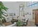 Bright living room with high ceilings, neutral walls, arched windows, and comfortable seating at 8120 E Cortez Dr, Scottsdale, AZ 85260