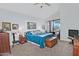 Tranquil main bedroom with vaulted ceilings, a private balcony and blue accents at 8120 E Cortez Dr, Scottsdale, AZ 85260