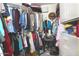 Organized walk-in closet with ample hanging space, shelving, and drawers at 8120 E Cortez Dr, Scottsdale, AZ 85260