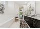 Modern bathroom features double sinks, sleek cabinetry, and a soaking tub at 8216 E Angel Spirit Dr, Scottsdale, AZ 85255