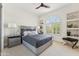 Charming bedroom with a neutral palette, gray furnishings, and a window with plantation shutters at 8216 E Angel Spirit Dr, Scottsdale, AZ 85255