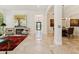 Spacious foyer boasts marble floors, stylish decor, and a clear view of the entrance at 8216 E Angel Spirit Dr, Scottsdale, AZ 85255