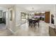 Spacious home showcasing a large kitchen and dining area with a sliding glass door to a backyard at 922 S Ember Cir, Mesa, AZ 85208