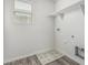 Laundry room with window and washer/dryer hookups at 923 E Agua Fria Ln, Avondale, AZ 85323