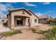 Charming backyard featuring a covered patio and desert landscaping at 9325 W Elwood St, Tolleson, AZ 85353