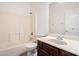 Bathroom featuring a shower-tub combination and a single sink vanity with cabinet storage at 9325 W Elwood St, Tolleson, AZ 85353