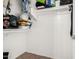 Walk-in closet with white shelving, offering ample storage space for clothes and accessories at 9325 W Elwood St, Tolleson, AZ 85353