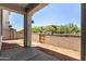 A quaint backyard featuring a walled garden offering privacy and potential for landscaping at 9408 E Sequence Ave, Mesa, AZ 85212