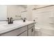 Modern bathroom featuring a double sink vanity and a shower-tub combination at 9408 E Sequence Ave, Mesa, AZ 85212