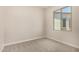 Bedroom with a view from the window, carpet, and electrical outlets at 9408 E Sequence Ave, Mesa, AZ 85212