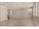 Living room featuring hard surface floors and staircase access at 9408 E Sequence Ave, Mesa, AZ 85212
