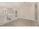 Upstairs loft area with carpeted floors and access to multiple rooms at 9408 E Sequence Ave, Mesa, AZ 85212
