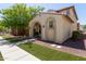 Inviting single-story home featuring desert landscaping, a covered entryway, and a tile roof at 9412 S 34Th Dr, Laveen, AZ 85339