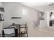 A carpeted upstairs hallway area provides flexible space as an open office or study area at 9412 S 34Th Dr, Laveen, AZ 85339
