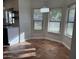 Cozy dining area featuring tile flooring and natural light, with views of the neighborhood at 1010 N Osprey Ct, Gilbert, AZ 85234