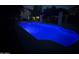 Beautiful in-ground pool with underwater lighting at night at 1010 N Osprey Ct, Gilbert, AZ 85234