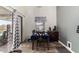 Bright dining room with sliding glass doors and tile flooring at 10211 W Hazelwood Ave, Phoenix, AZ 85037