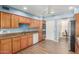 Open kitchen area with stainless steel sink, and modern appliances at 1036 N Sierra Hermosa Dr, Litchfield Park, AZ 85340