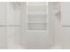 Walk-in closet featuring built in shelves and hanging storage at 1036 N Sierra Hermosa Dr, Litchfield Park, AZ 85340