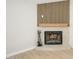 Living room showcases a modern fireplace with unique wood and tile accents at 1102 W Peoria Ave # 17, Phoenix, AZ 85029