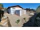 Backyard featuring a storage shed, offering practical outdoor storage solutions at 11216 N 52Nd Ave, Glendale, AZ 85304