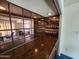 Stylish bar area featuring unique mirrored design and ample countertop space for entertaining guests at 11216 N 52Nd Ave, Glendale, AZ 85304