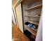 Linen closet with shelving provides storage for bedding and towels at 11216 N 52Nd Ave, Glendale, AZ 85304