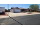 Attractive one-story house with a clean facade, spacious driveway and an attached garage at 11216 N 52Nd Ave, Glendale, AZ 85304