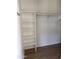 A spacious walk-in closet featuring shelving and ample storage space at 12586 W Amelia Ave, Avondale, AZ 85392