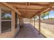 Covered patio with view of backyard and landscaping at 1371 W Gary Dr, Chandler, AZ 85224