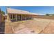 Backyard showcasing the covered patio, yard, and block fence at 1371 W Gary Dr, Chandler, AZ 85224