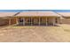 Backyard showcasing the covered patio and block fence at 1371 W Gary Dr, Chandler, AZ 85224