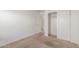 Bedroom featuring a closet and a connecting door at 1371 W Gary Dr, Chandler, AZ 85224