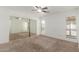Spacious bedroom with carpet, mirrored closet doors and bright window at 1371 W Gary Dr, Chandler, AZ 85224