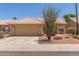 Charming single-story home features a desert landscape, a two-car garage, and a tiled roof at 1371 W Gary Dr, Chandler, AZ 85224