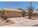 Single story home with 2 car garage, desert landscaping, and tiled roof at 1371 W Gary Dr, Chandler, AZ 85224