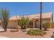 Single story home with desert landscaping, tiled roof, and a 2 car garage at 1371 W Gary Dr, Chandler, AZ 85224