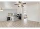 Open kitchen featuring white cabinets, tile floors, and a convenient island at 1371 W Gary Dr, Chandler, AZ 85224
