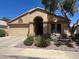 Charming single-story home featuring a well-maintained front yard, neutral stucco, and attached two-car garage at 17293 N Ponca Way, Surprise, AZ 85374