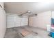 Spacious garage with ample storage cabinets and a clean, well-maintained interior at 17293 N Ponca Way, Surprise, AZ 85374
