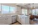 Bright kitchen featuring ample counter space, stainless steel appliances, and adjacent dining area at 17293 N Ponca Way, Surprise, AZ 85374